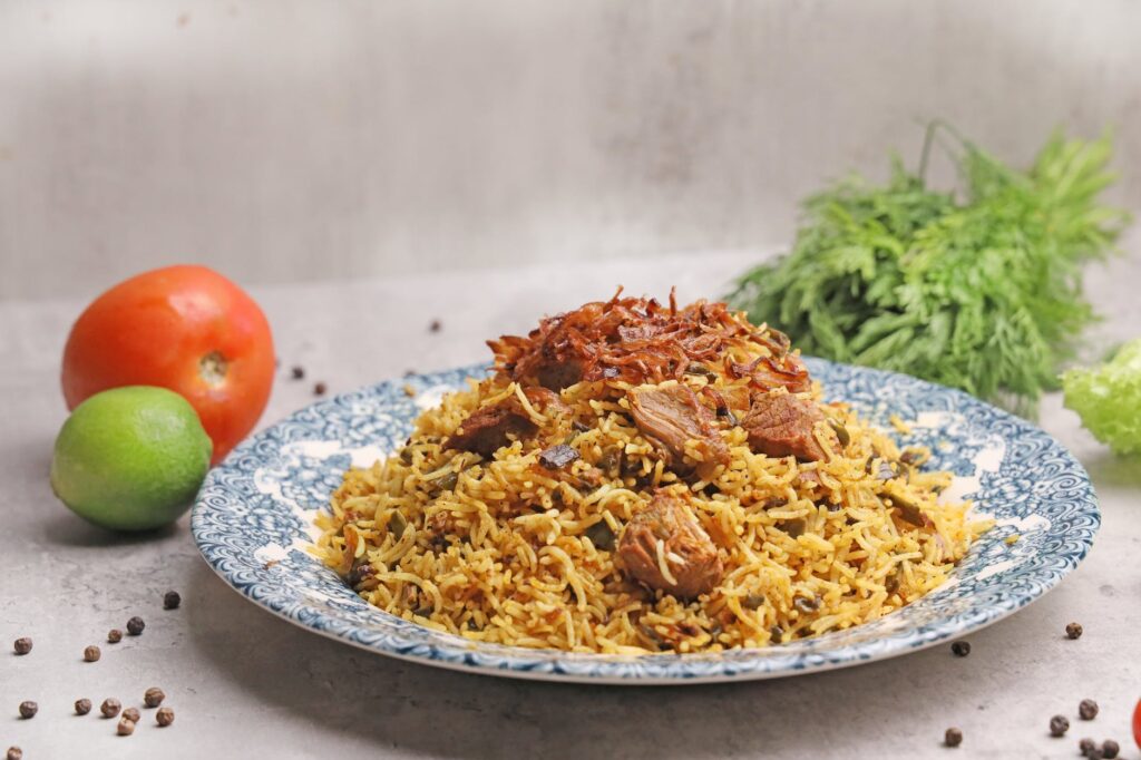 mouthwatering biryani meal on ceramic plate