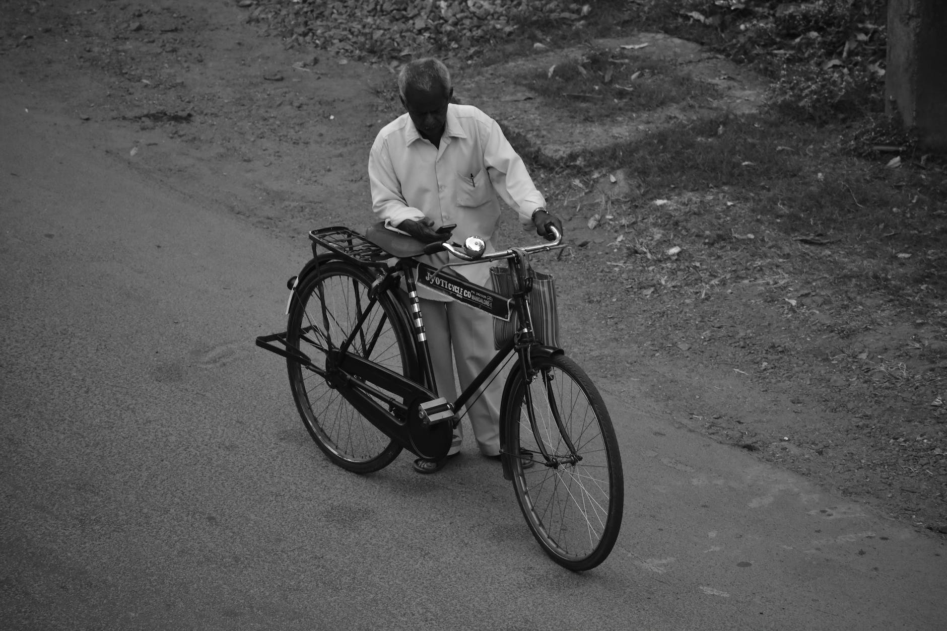 man beside bicycle