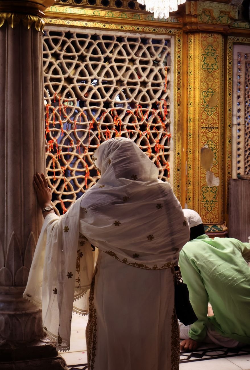 devotees praying at a historic delhi mosque