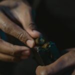 hand loading bullet in a gun magazine