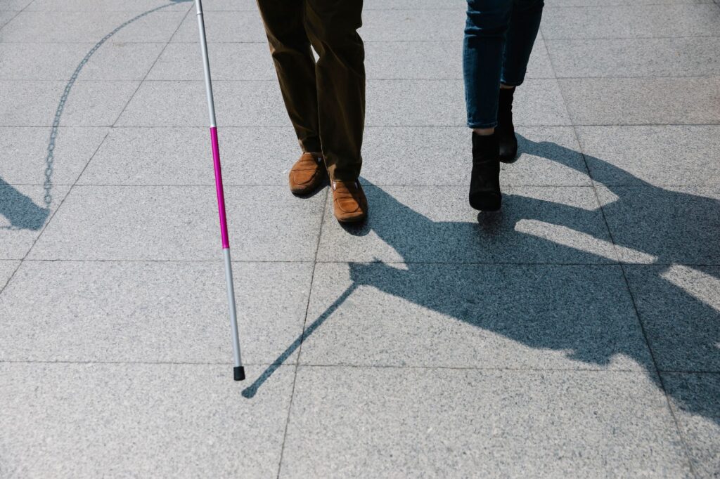photo of people walking on side walk