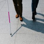 photo of people walking on side walk