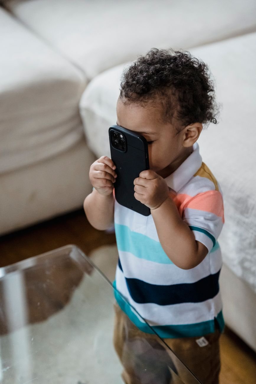 child holding a smartphone
